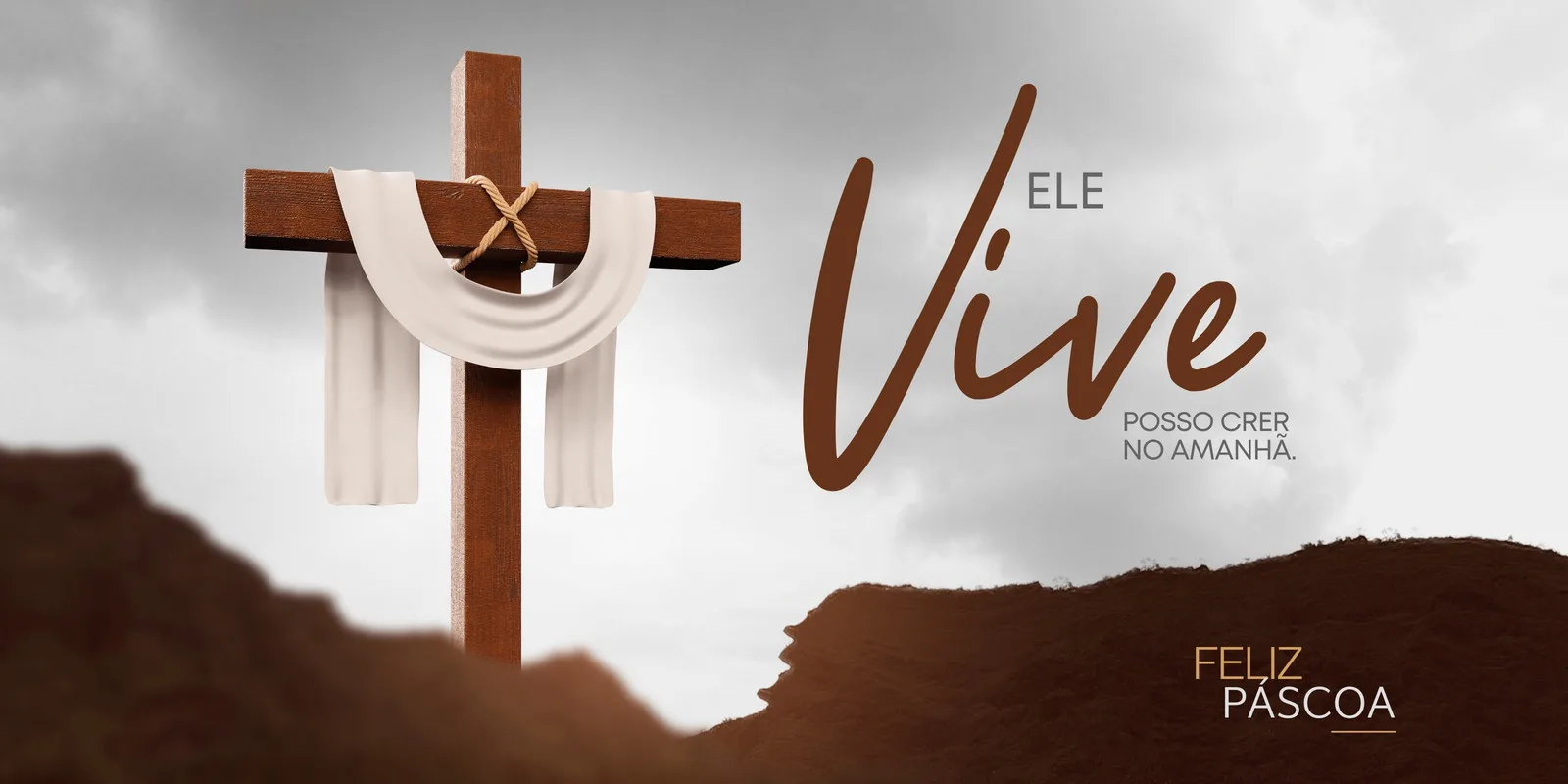 Banner horizontal com uma cruz de madeira adornada com panos brancos, simbolizando a ressurreição. Ao lado, a frase "Ele Vive" em destaque, com a legenda "Posso crer no amanhã" e "Feliz Páscoa". O fundo é um céu nublado com tons de cinza e marrom.