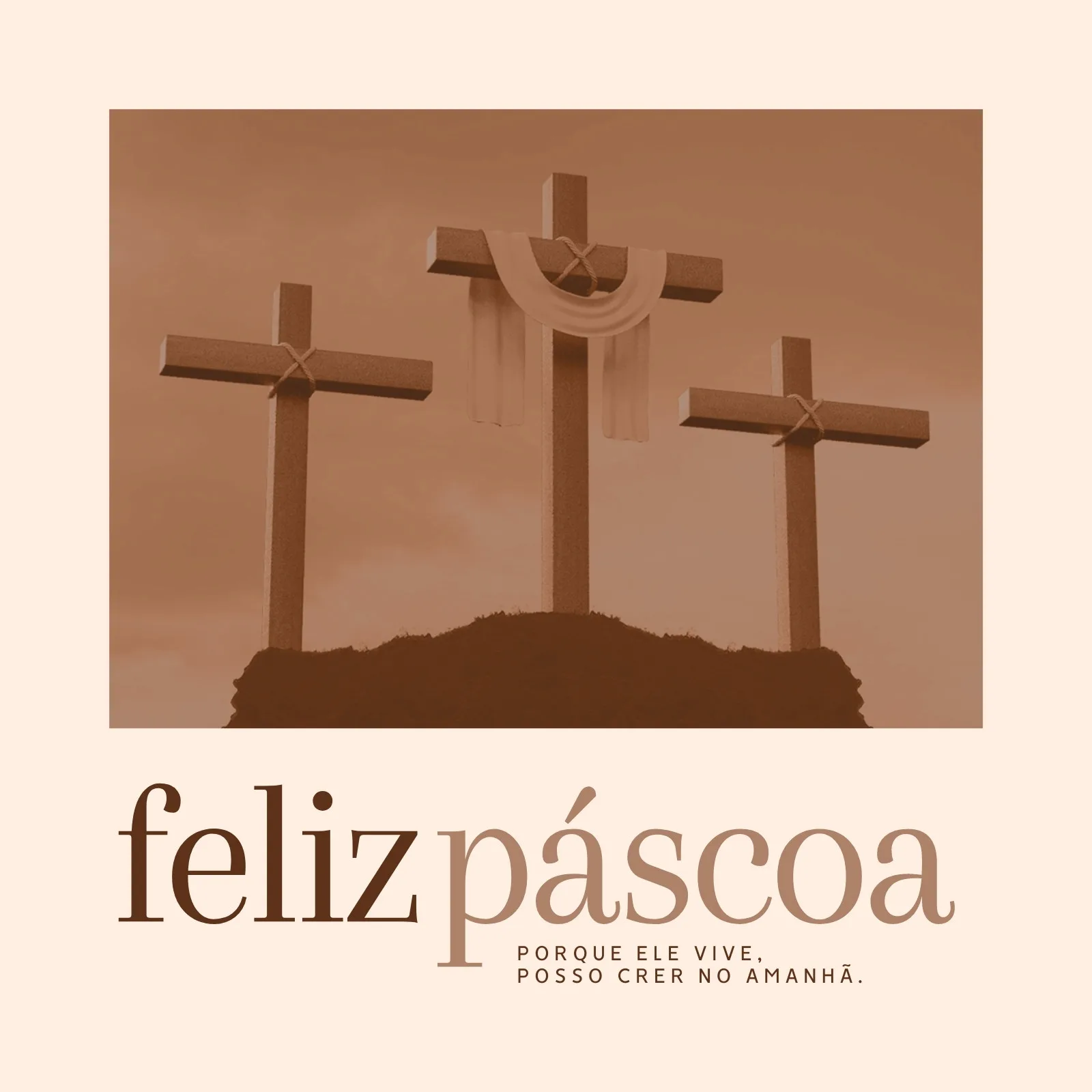 Três cruzes em um monte sob um céu nublado, com um tecido drapeado sobre a cruz central. Abaixo, a frase 'Feliz Páscoa, porque Ele vive, posso crer no amanhã.' em tipografia elegante.