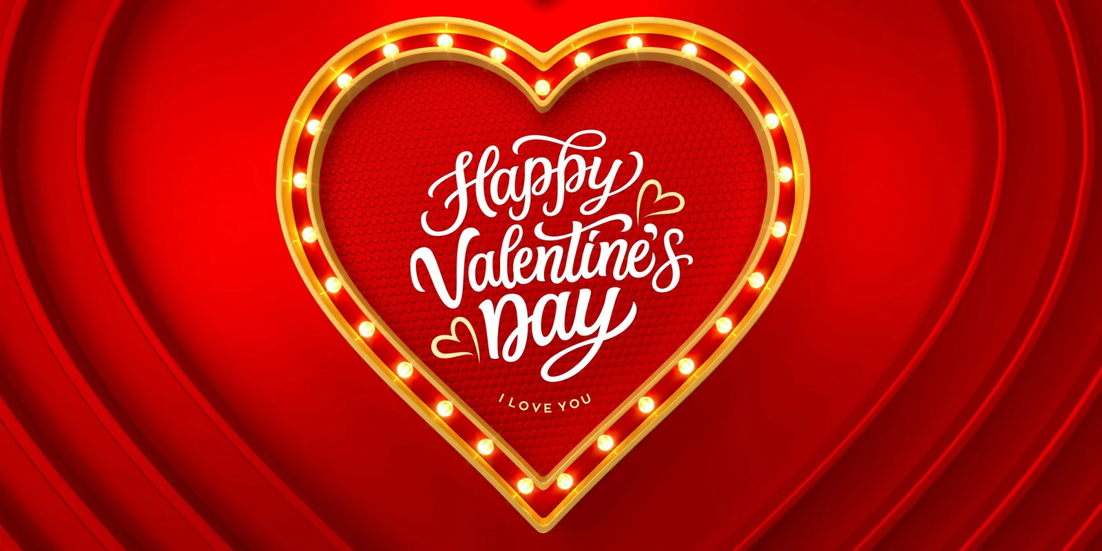 Banner horizontal vermelho com um grande coração iluminado por lâmpadas douradas, exibindo a mensagem 'Happy Valentine's Day' em caligrafia branca e a frase 'I LOVE YOU' abaixo. O fundo tem um efeito de ondas vermelhas.
