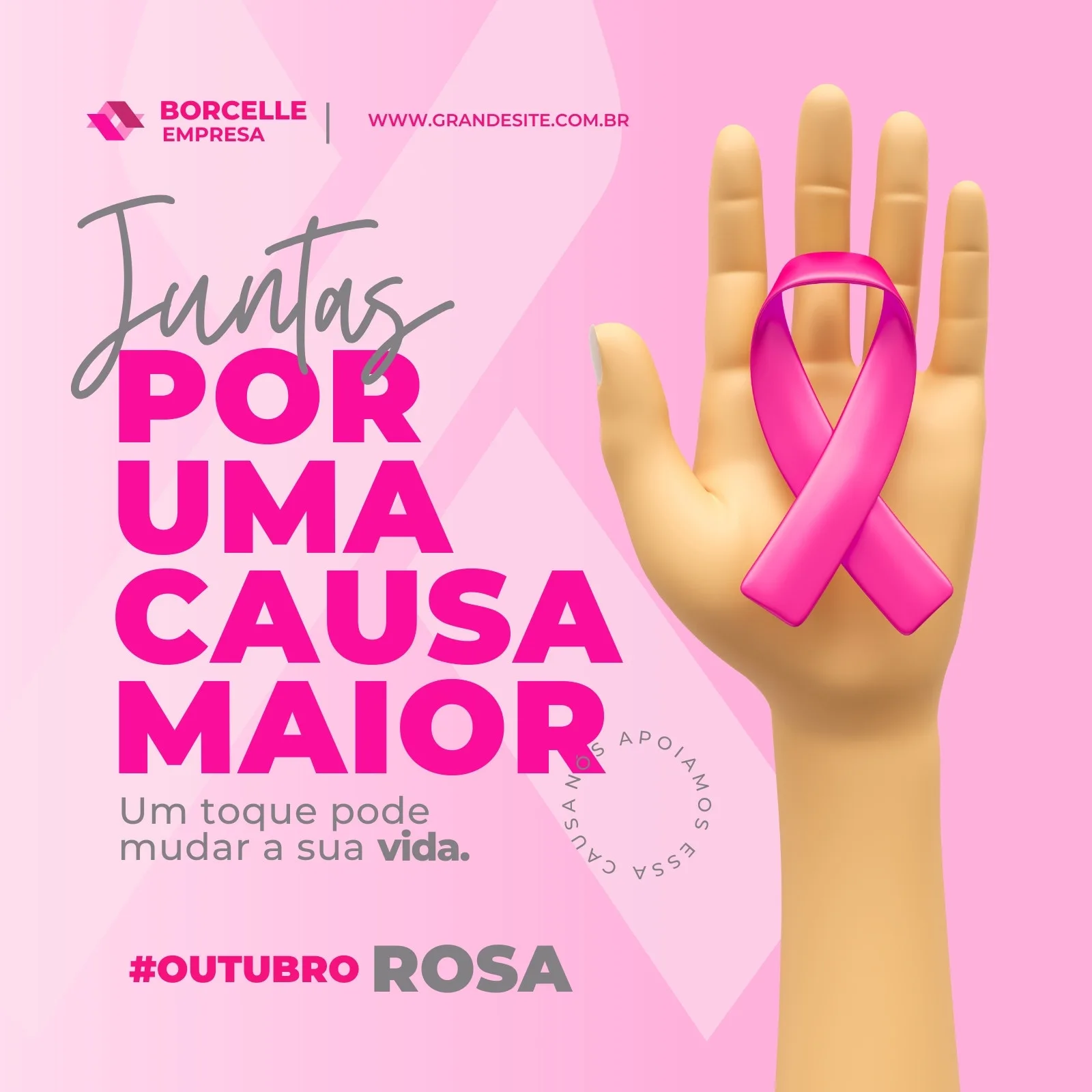 Post para redes sociais com fundo rosa e cinza, destacando a frase 'Juntas Por Uma Causa Maior' e um laço rosa de conscientização sobre o câncer de mama. Uma mão exibe o laço, simbolizando apoio e prevenção.